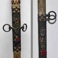          scabbard front details with 2 enameled crosses
   