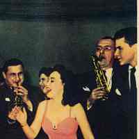          Frank Sinatra partially seen at right edge
   