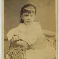 Carte-de-visite of a girl posed in photographer