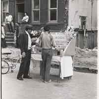 B+W photo of a memorial outside a lot where a burnt-out residential building was demolished, Hoboken, no date, [circa September, 1974.]