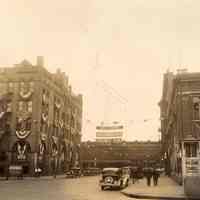 Sepia-tone photo of signs and bunting celebrating the Seaboard Trust Company, Hoboken, 1933.