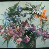 Lantern slide, color, of a floral arrangement in basket, used for promotional display in Hoboken, no date, ca. 1920.