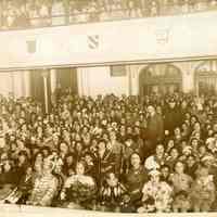 Color copy photo of a sepia-tone photo of an assembly in the Connor