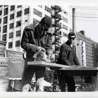 B+W photos, 5, of life test, Black & Decker circular saw torture test, at or near United States Testing Co. facility, Hoboken, N.d., ca. 1970-1980.