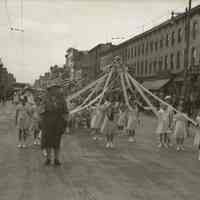 Digital image of B+W negative image of a Hoboken Playgrounds girls marching unit on Washington St., Hoboken, no date, circa 1938-1940.