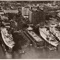 B+W aerial photo looking west of the waterfront from Twelfth St. to Weehawken looking west, Hoboken, no date, [1964].