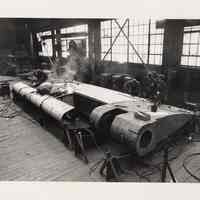 B+W photo of S.S. Eagle Courier rudder being rebuilt at Bethlehem Steel Shipyard, Hoboken, n.d., ca. 1974-1976.