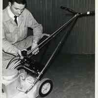 B+W photo of current draw test on an electric lawn mower at United States Testing Co. facility, Hoboken, N.d., ca. 1970-1980.