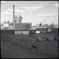 B+W photo negative: Maxwell House Coffee plant, Penn. R.R. car float & marine fleet repair yard, River Rd. near 9th St., Hoboken, Nov. 12, 1946.