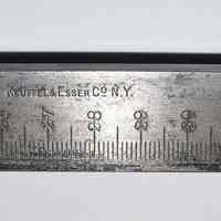          detail measuring bar with K&E mark
   