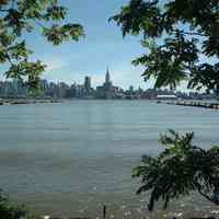 Color photos, 2, of views from Hoboken with trees towards New York City, August 12, 2006.