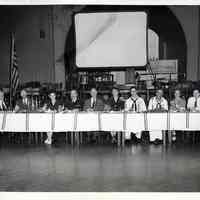 B+W photos, 4, of a testimonial dinner of United States Testing Co. employees, n.d., ca. 1942-1950.