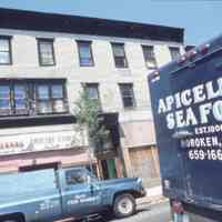 Color slide of building under renovation on or near First and Clinton Sts., Hoboken, ca. 1983-84.