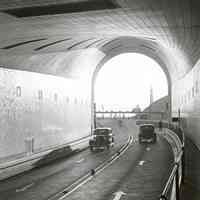 Lantern slide: New Jersey. Lincoln Tunnel: Looking out of Tunnel at Western Portal. (1938).