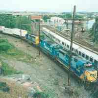          Digital image of color photo of a PATH train approaching Journal Square station from the east, June, 1999. picture number 1
   