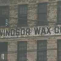 Color photo of painted sign on building for Windson Wax Company, Observer Highway at Jackson Street, Hoboken, Jan. 3 & 4, 2002.