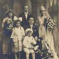 Sepia-tone group studio photo of Guiseppi Limoni, his wife and some of the wedding party, Hoboken, no date, ca. 1918-20.