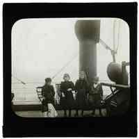 B+W lantern slide of Irish immigrants, children at play, on deck of a ship, n.p. (U.K.), 1898.