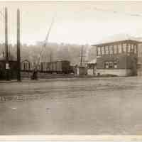 B+W photo looking west on 17th St. across Willow Ave. from east of Willow; streetcar tracks & freight rail crossing, Hoboken, n.d., (1927).