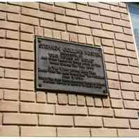 Color photo of Stephen Collins Foster plaque, 601 Bloomfield St., Hoboken, June 1982.