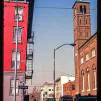 Color slide of eye-level view from the SE corner of Hudson & 4th looking W