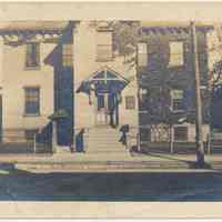 Sepia-tone photo of ivy-covered building, location not indicated, Hoboken?; photo from Hoboken source, n.d., ca. 1910-1920.