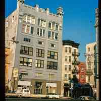 Color slide of eye-level view of facades of the Terminal Building at 70 Hudson Street, the Hotel Edwards at 72 Hudson, and the Hudson Spa at 74 Hudson on the NW corner of Hudson Place