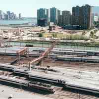          Digital image of color photo of an aerial view of New Jersey Transit passenger trains locomotives in the yard, Hoboken Terminal, Hoboken, Sept. 2002. picture number 1
   