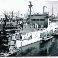 B+W photo of the painting of berthed unknown freighter, Hoboken, no date, ca. 1940.