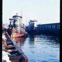 Color slide of a three tug boats.