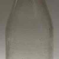 Bottle, milk: Janssen Dairy, Hoboken, N.J., 1 qt., no date, ca. 1950.