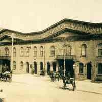 Sepia-tone photo of The Hoboken Riding Academy on the east side of Hudson St. between 2nd & 3rd Sts., Hoboken, no date, ca. 1890.