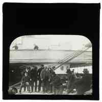 B+W lantern slide of Irish immigrants on deck of a ship, n.p. (U.K.), 1898.