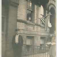 Color copy of a B+W photo of Fire Captain Henry "Pep" Kruse in front of Engine Co. No. 4, Hoboken, no date, ca. 1950.