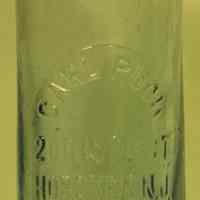 Bottle: Carl Puck, 20 River St., Hoboken, N.J., no date, ca. 1900-1920.