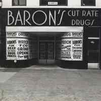 B+W photo of the storefront of Baron