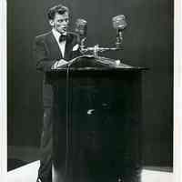 Sinatra photo: Frank Sinatra at podium speaking to a war vets rally about housing & other issues, Madison Square Garden, N.Y., May 16, 1946.