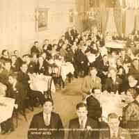 Sepia-tone group photo of the Annual Dinner-Dance sponsored by the Hoboken Businessmen
