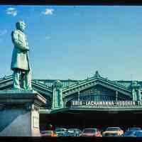 Color slide of eye-level view of the Lackawanna Terminal façade with Sam Sloan statue