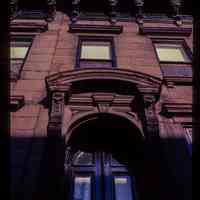 Color slide of eye-level view of façade, cornice, brackets, window heads and portico at 1017 Bloomfield between 10th and 11th