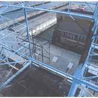 Color photo of the back of the Maxwell House Coffee sign support structure, building no. 2, pier 11, storage silos, building no. 9, Hoboken, n.d, ca. 2000.