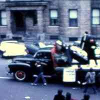          truck with coffin; Elysian Flats in background
   