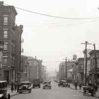          photo 4, detail center: buildings at corners of Adams & 6th Sts.; pushcart
   