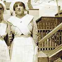 Digital image of sepia-tone photo of Leonore Toepfer (Muller) in a volunteer uniform similar to 
