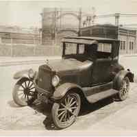 Sepia-tone photos, 2, of automobile parked on Clinton St. between 12th & 13th Sts., Hoboken, n.d., probably 1927 (license plate date.)