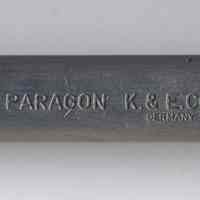          detail of bar with model name & maker's mark
   