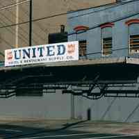 Three color photos of signs for United Hotel & Restaurant Supply Co., 550 Observer Highway, Hoboken, Jan. 3 & 4, 2002.