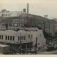Sepia-tone photo of steel frame erection & Newark St. frontage for the Fabian Theatre, Newark & Washington Sts., Hoboken, March 20, 1928.