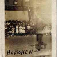 Digital image of sepia-tone photo of Hoboken Playground Band marching, Hoboken, 1917.