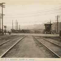 B+W photo looking west on 17th St at Willow Ave.; streetcar tracks & freight rail crossing, Hoboken, n.d., (1927).